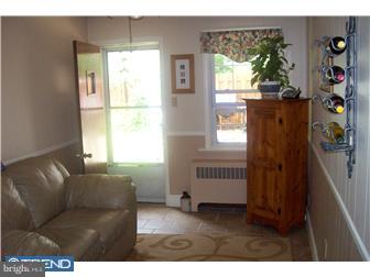 726 Dale Road Huntingdon Valley, PA 19006 - Photo 8 of 12 a living room with furniture and a window