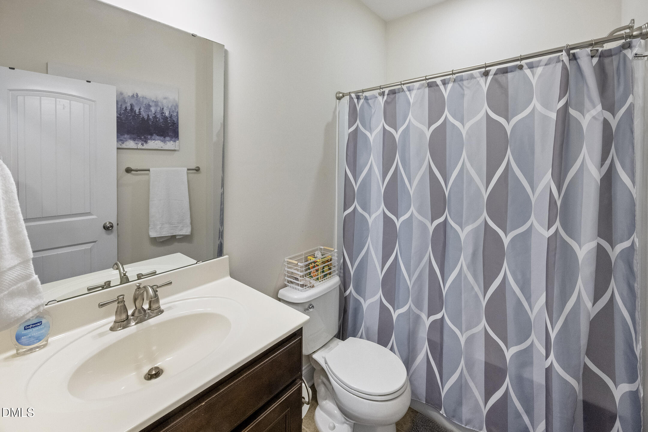 3541 Fairstone Road Wake Forest, NC 27587 - Photo 13 of 39 a bathroom with a sink toilet and a mirror