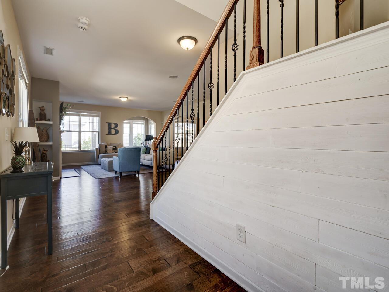 207 Maple Walk Street Durham, NC 27703 - Photo 4 of 50 a view of entryway and hall with wooden floor