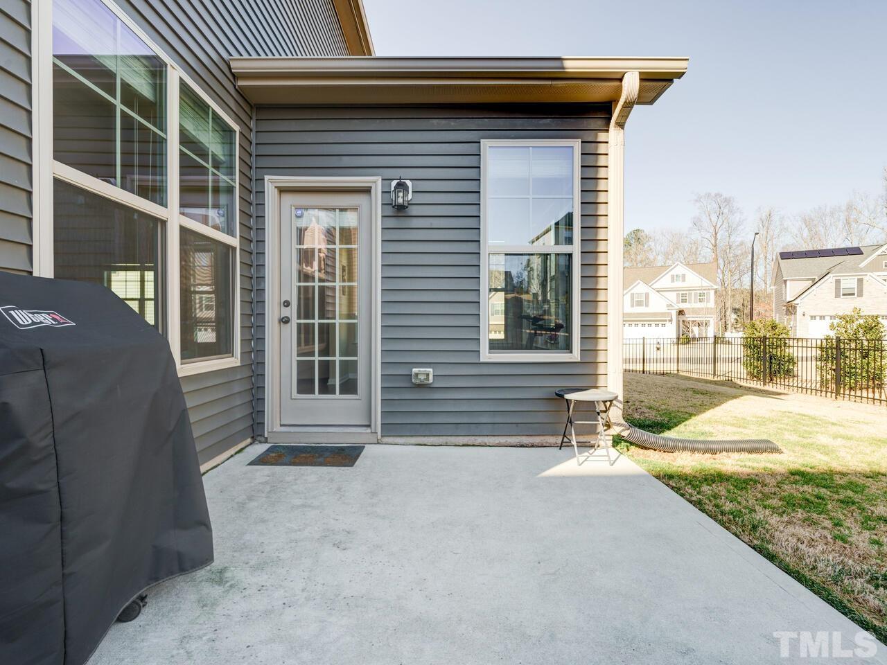 207 Maple Walk Street Durham, NC 27703 - Photo 47 of 50 a view of a house with a patio