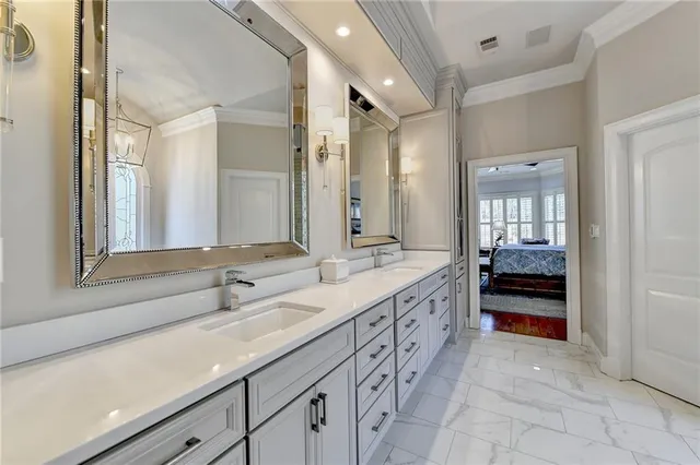 a bathroom with a tub a sink and shower