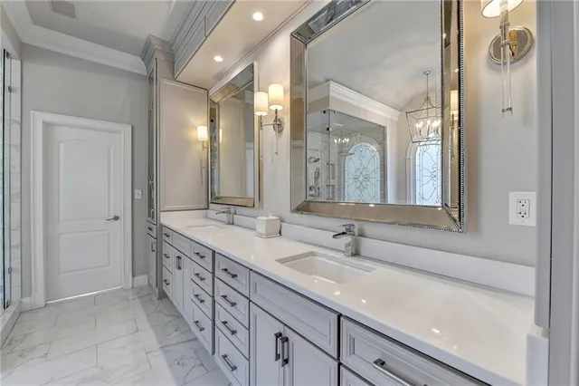 a kitchen with a sink stove and cabinets