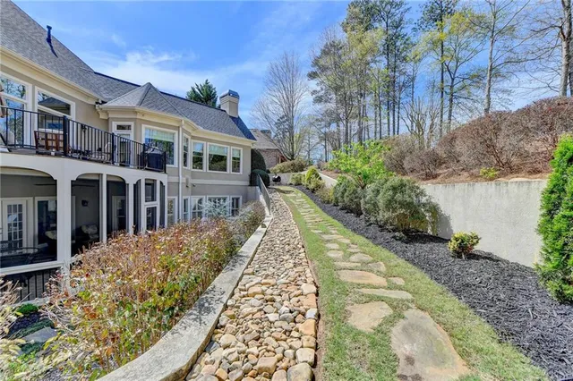 a view of a patio with a table chairs and a table