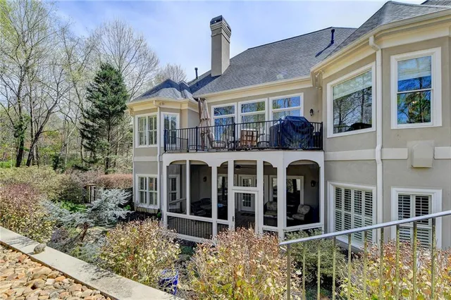 a view of a yard with cars