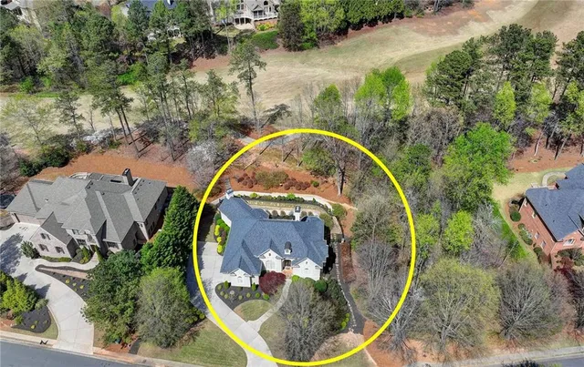 a view of a yard with trees