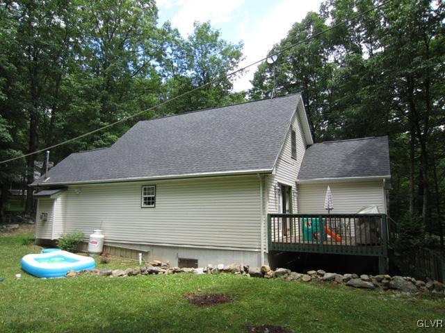 1110 Cameron Road Effort, PA 18330 - Photo 5 of 46 a front view of a house with garden