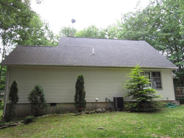 1110 Cameron Road Effort, PA 18330 - Photo 9 of 46 a view of house with garden and a tree