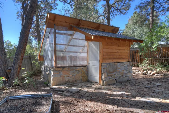 a view of a room with racks on the wall