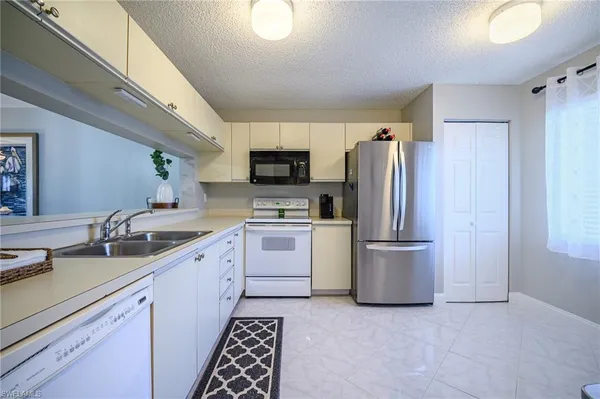 $259,900 | 6945 Dennis Circle, Unit I107, Naples, FL 34104