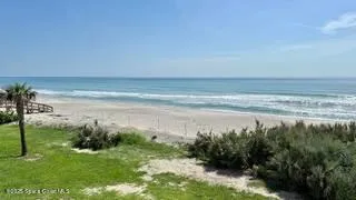 a view of a balcony with an outdoor space