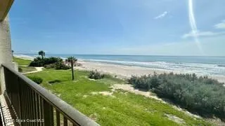 a view of a lake with a big yard