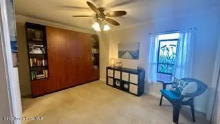 a white toilet sitting next to a shower curtain