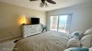 a bathroom with a granite countertop double vanity sink and a mirror