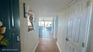 a view of a balcony with a floor to ceiling window