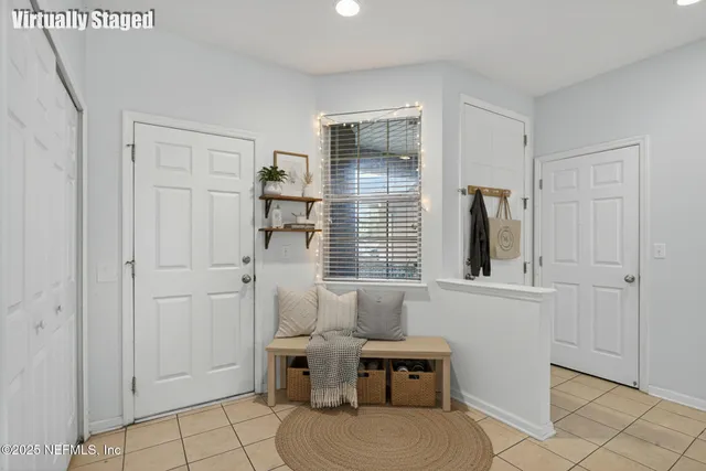 a spacious bathroom with a toilet and a shower