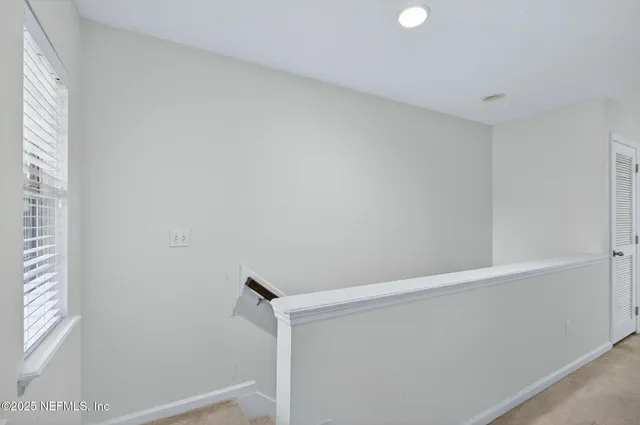 a view of small space with racks on the wall