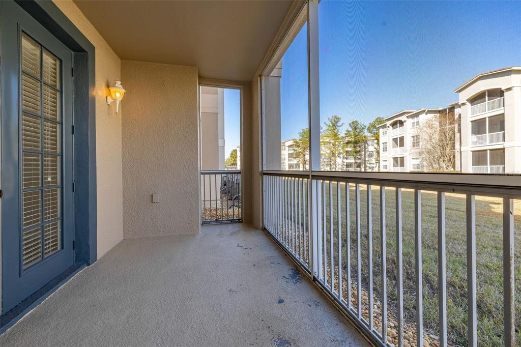 3001 Greystone Loop, Unit 106 Kissimmee, FL 34741 - Photo 18 of 27 a view of a balcony