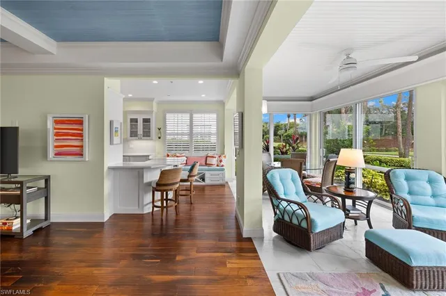 a work room with furniture and wooden floor