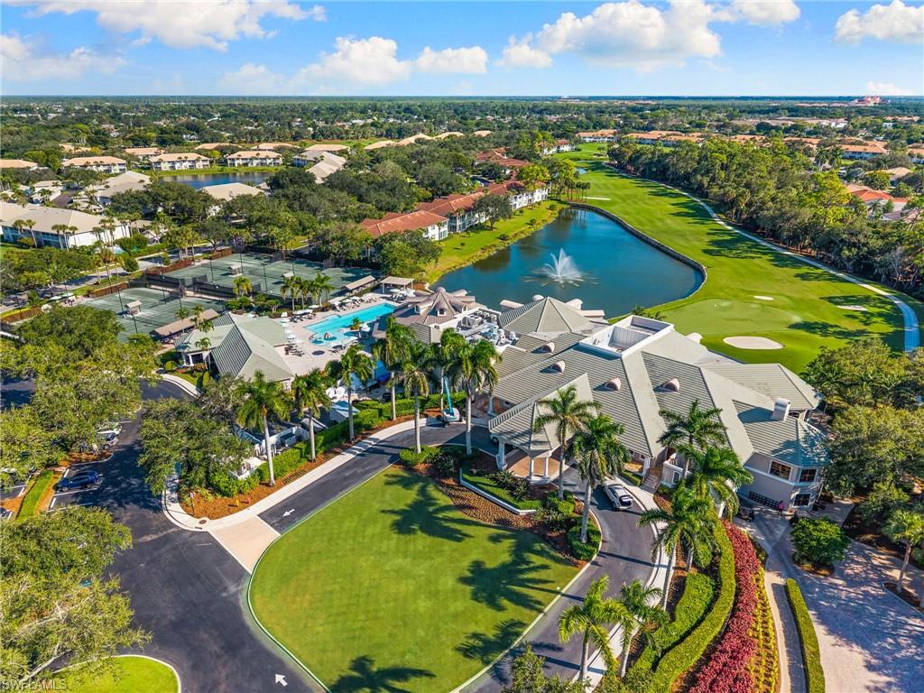 2120 Aberdeen Lane, Unit 101 Naples, FL 34109 - Photo 40 of 47 an aerial view of residential houses with outdoor space