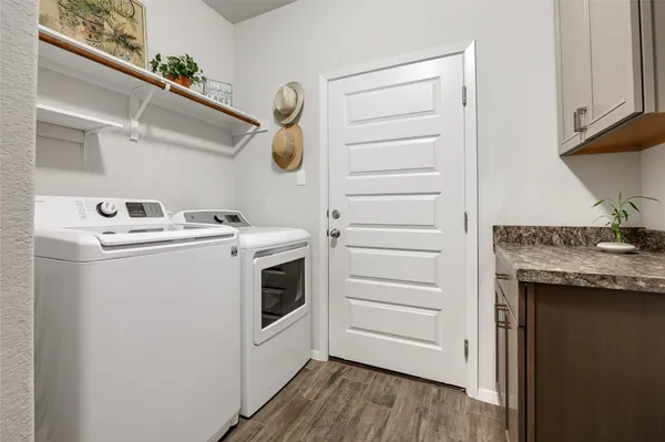 a utility room with dryer and washer
