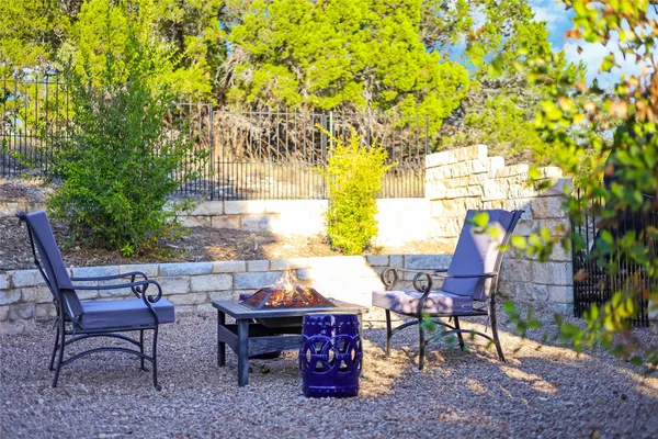 a view of an outdoor sitting area with chairs