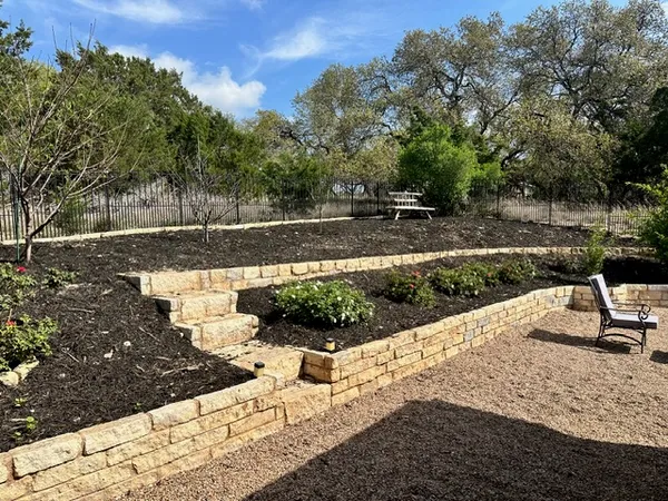a view of a bench in the garden