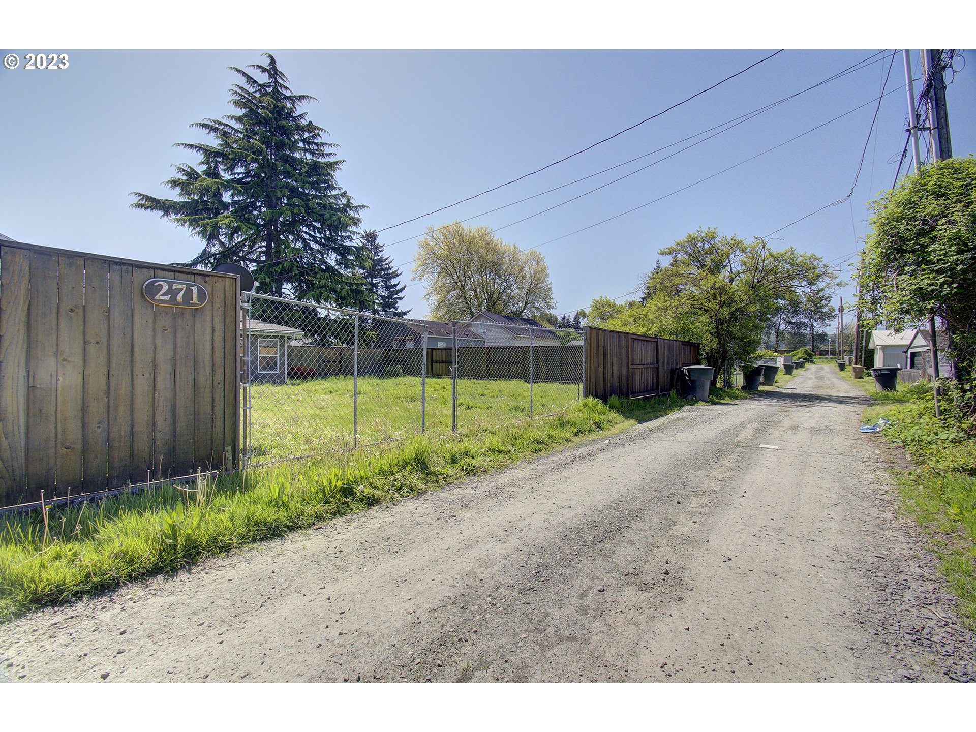 271 28th Avenue Longview, WA 98632 - Photo 23 of 29 a view of a house with backyard and a tree