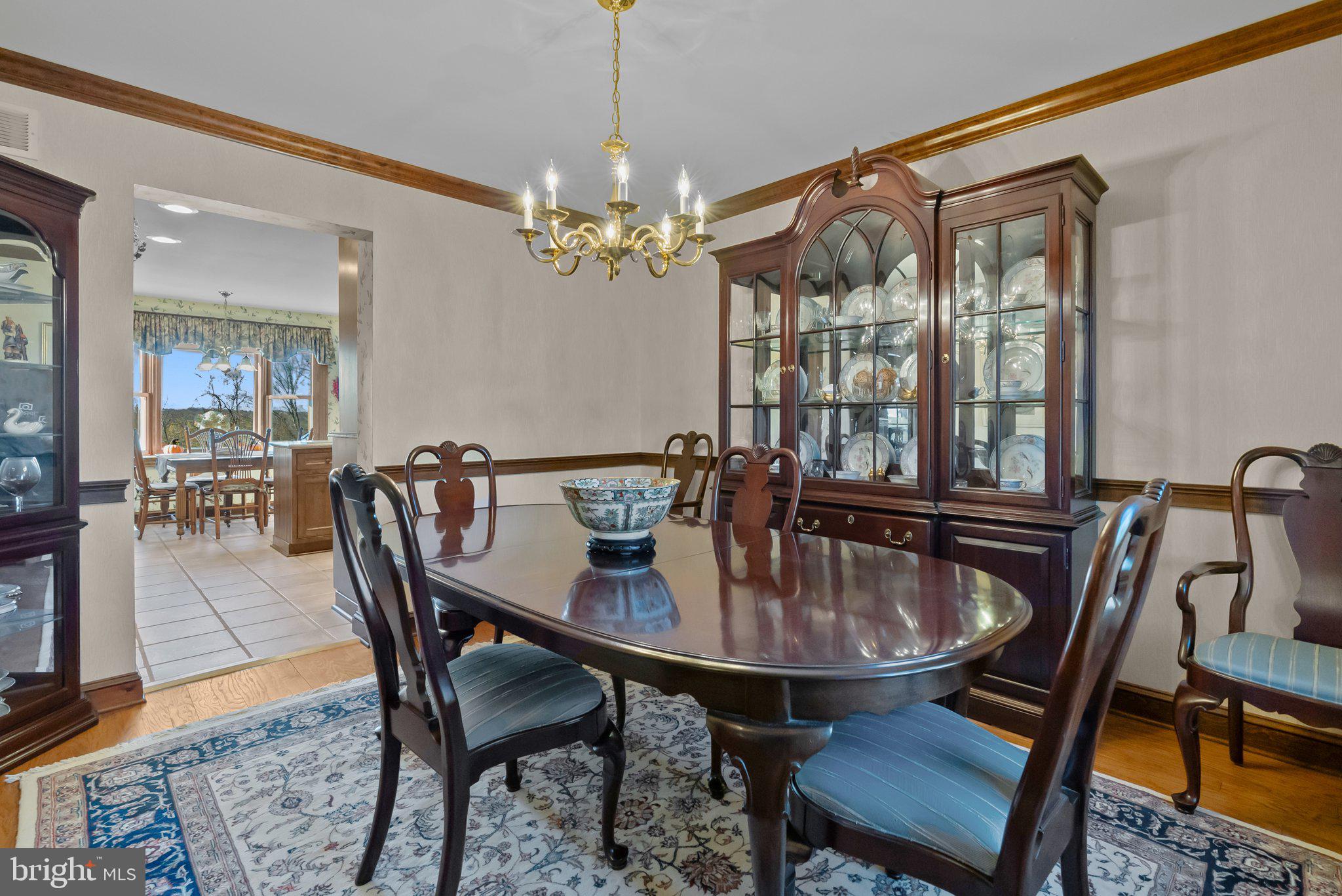 26 Hidden Turn Newtown, PA 18940 - Photo 12 of 40 a view of a dining room with furniture window and wooden floor