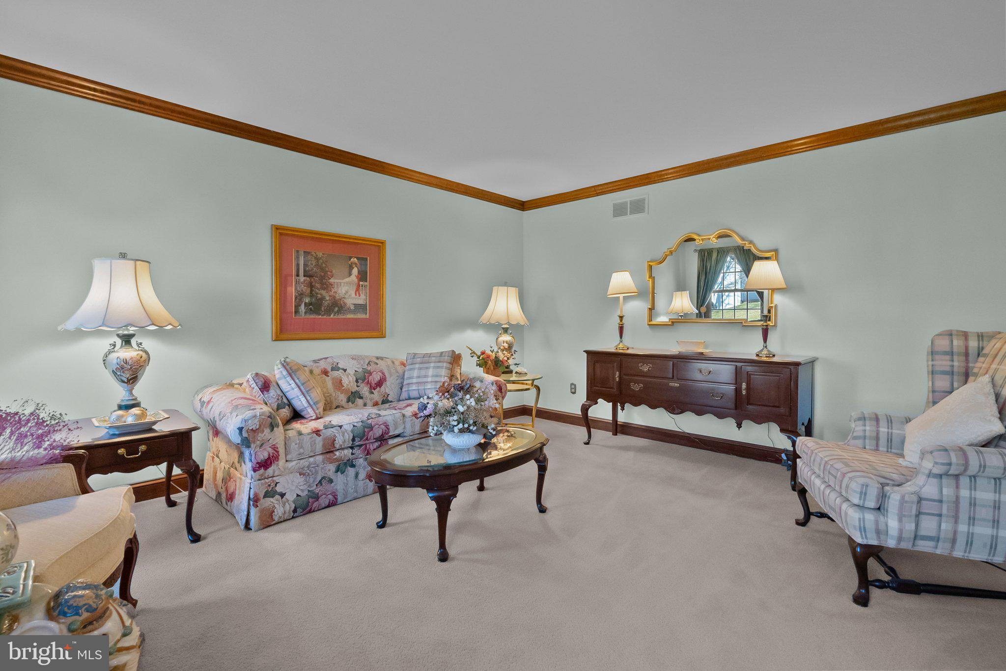 26 Hidden Turn Newtown, PA 18940 - Photo 13 of 40 a living room with furniture and a lamp