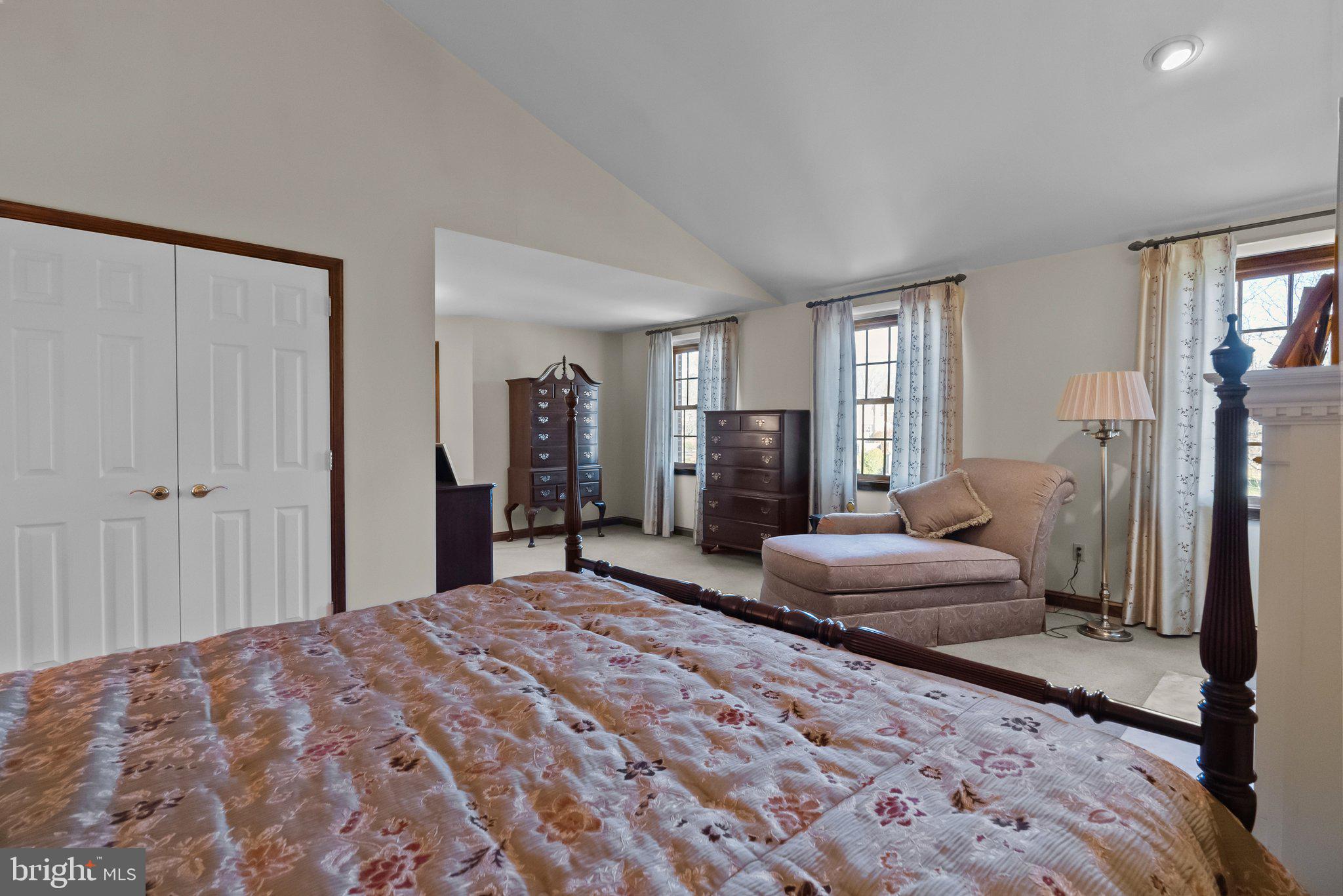 26 Hidden Turn Newtown, PA 18940 - Photo 20 of 40 a bedroom with a large bed and a dresser