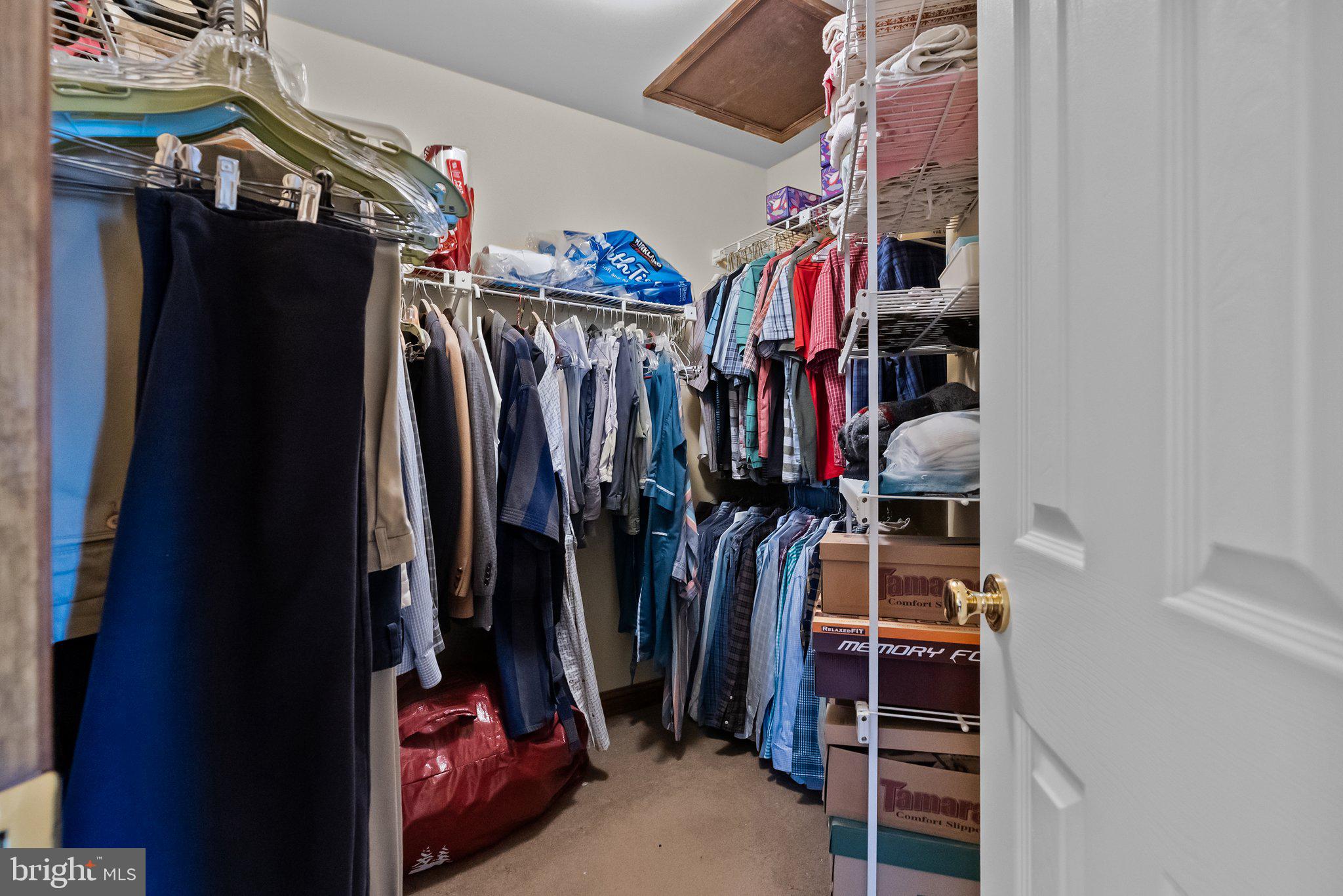 26 Hidden Turn Newtown, PA 18940 - Photo 23 of 40 a view of walk in closet with clothes
