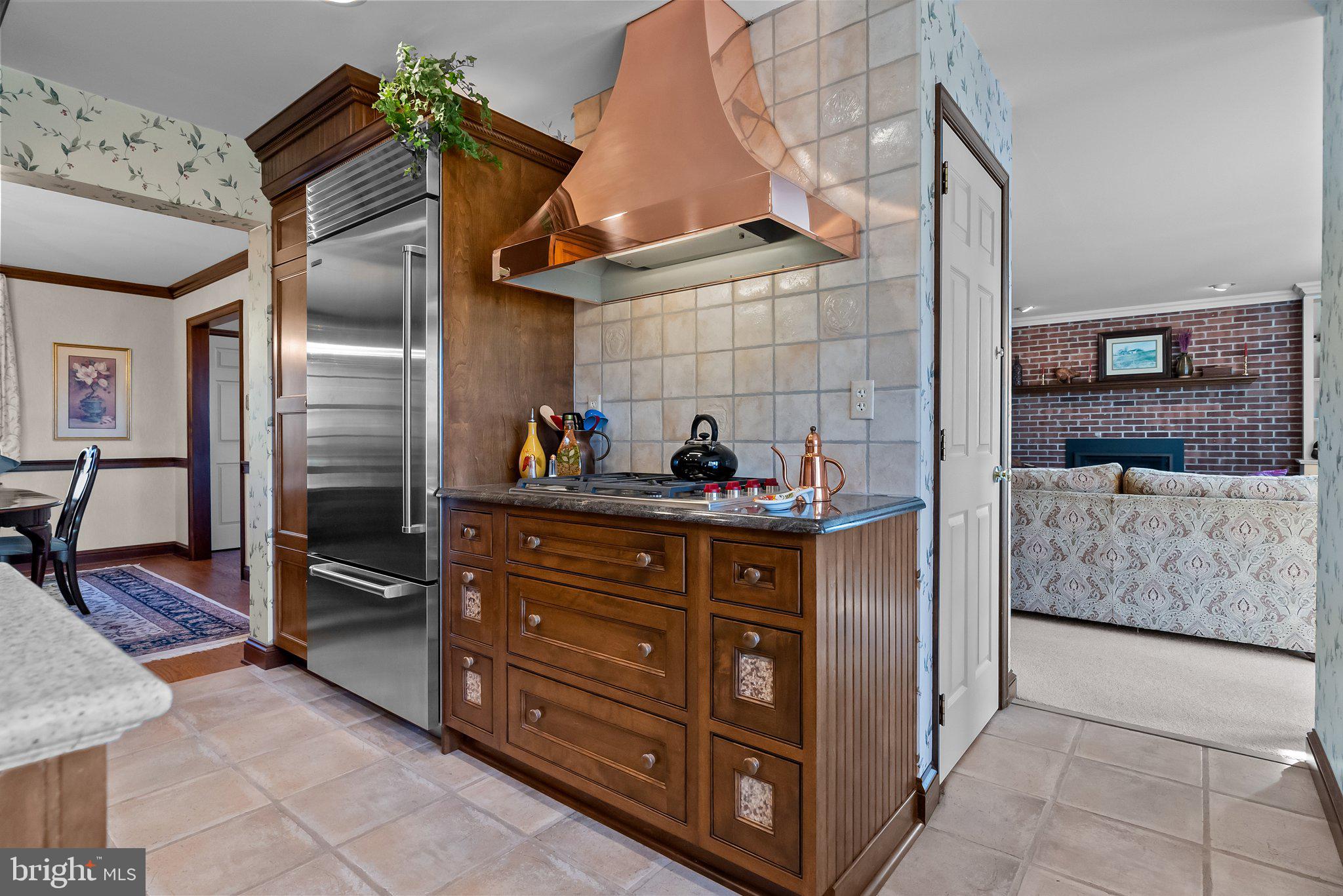 26 Hidden Turn Newtown, PA 18940 - Photo 5 of 40 a kitchen with stainless steel appliances granite countertop a refrigerator and a stove