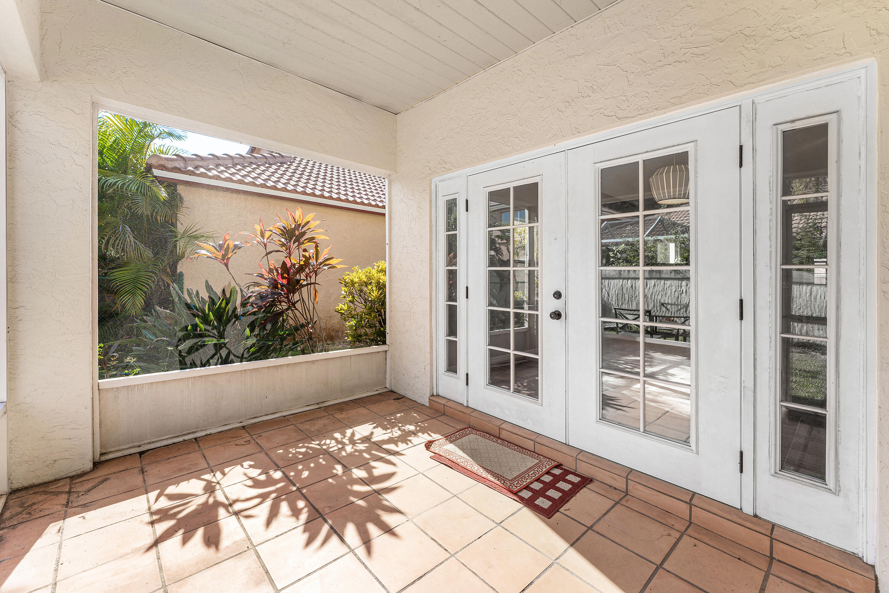 2100 Bonisle Circle Riviera Beach, FL 33418 - Photo 20 of 24 a view of a entryway door of the house