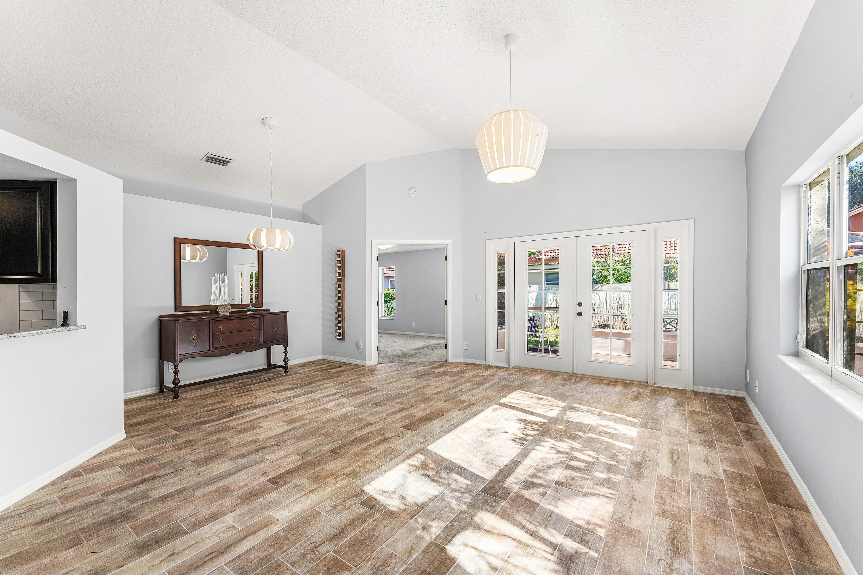 2100 Bonisle Circle Riviera Beach, FL 33418 - Photo 4 of 24 a bedroom with a bed and window