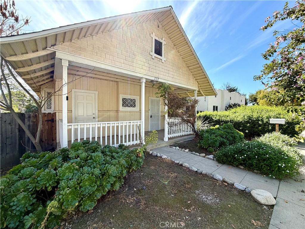 a view of a back yard of the house