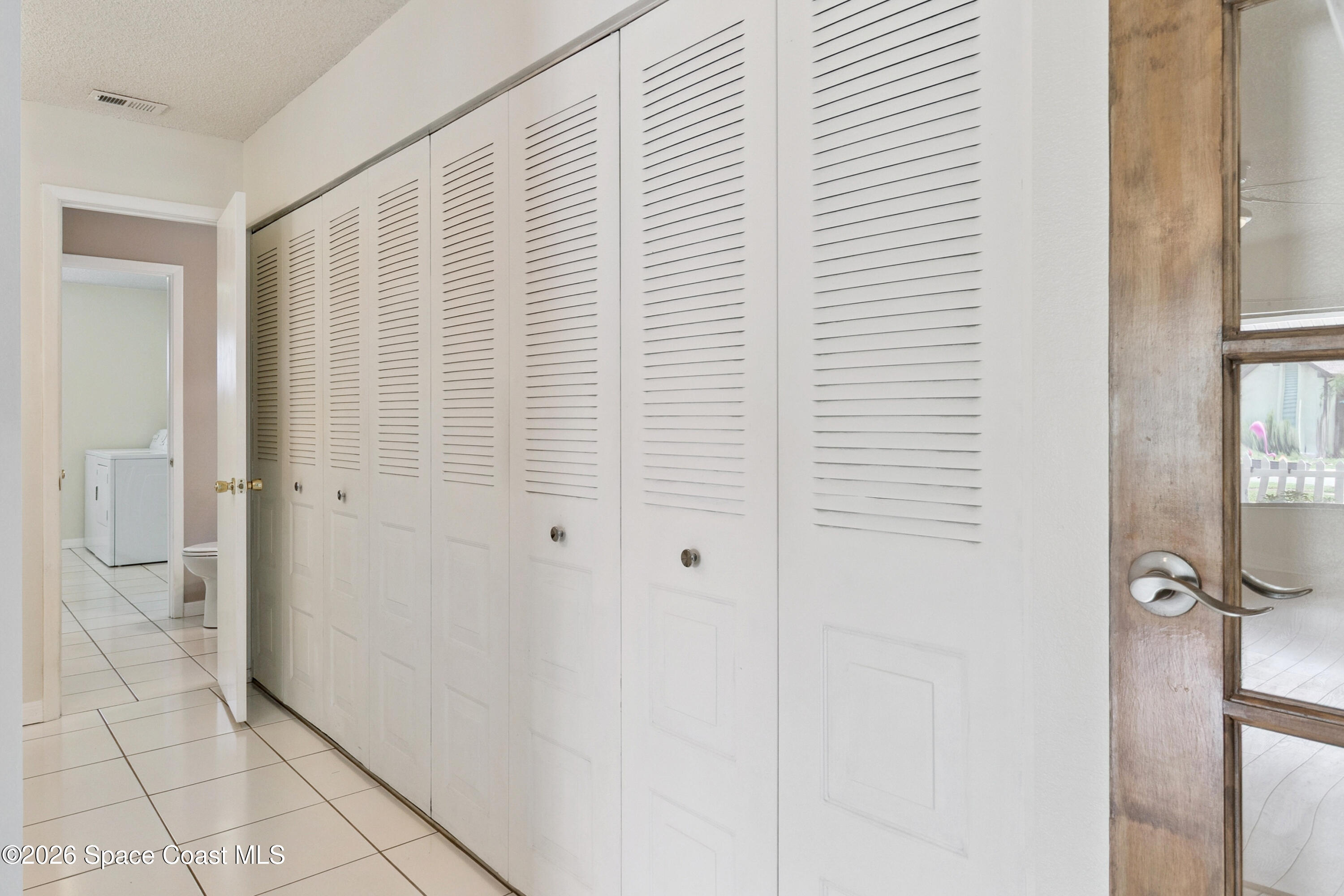 1334 Cherry Hills Road Northeast Palm Bay, FL 32905 - Photo 31 of 58 Bedroom 2 closets