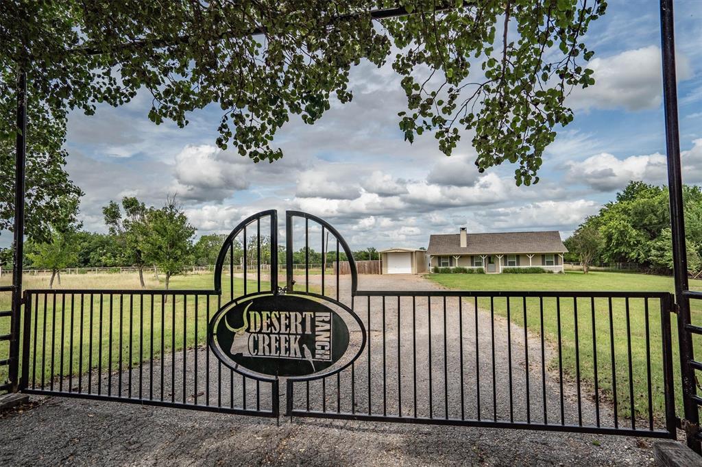 13132 Highway 78 Blue Ridge, TX 75424 - Photo 1 of 35 Wrought iron entry gates with custom ranch signage