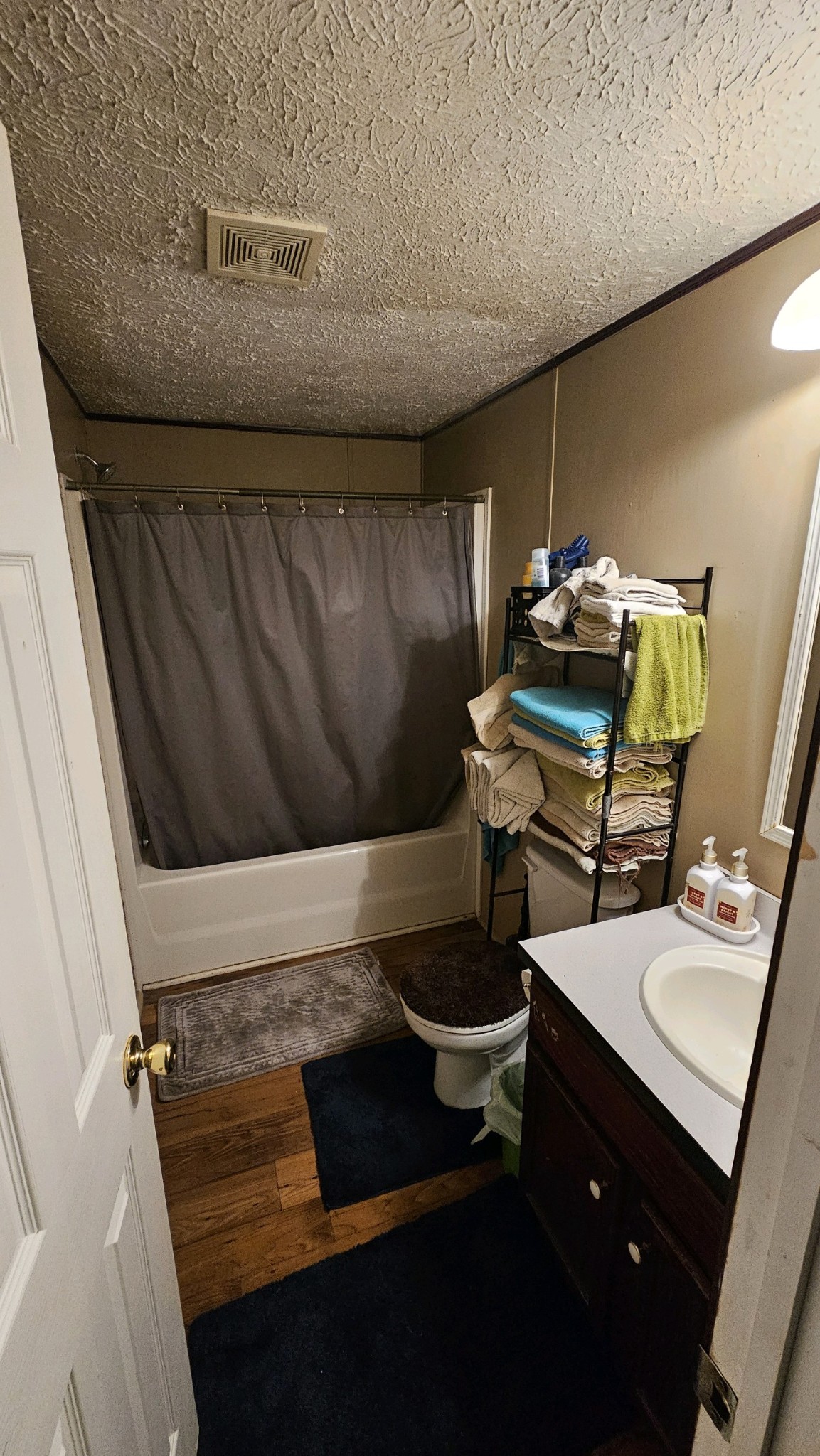 2228 Parker Road Morrison, TN 37357 - Photo 15 of 19 a bathroom with a sink toilet and a mirror