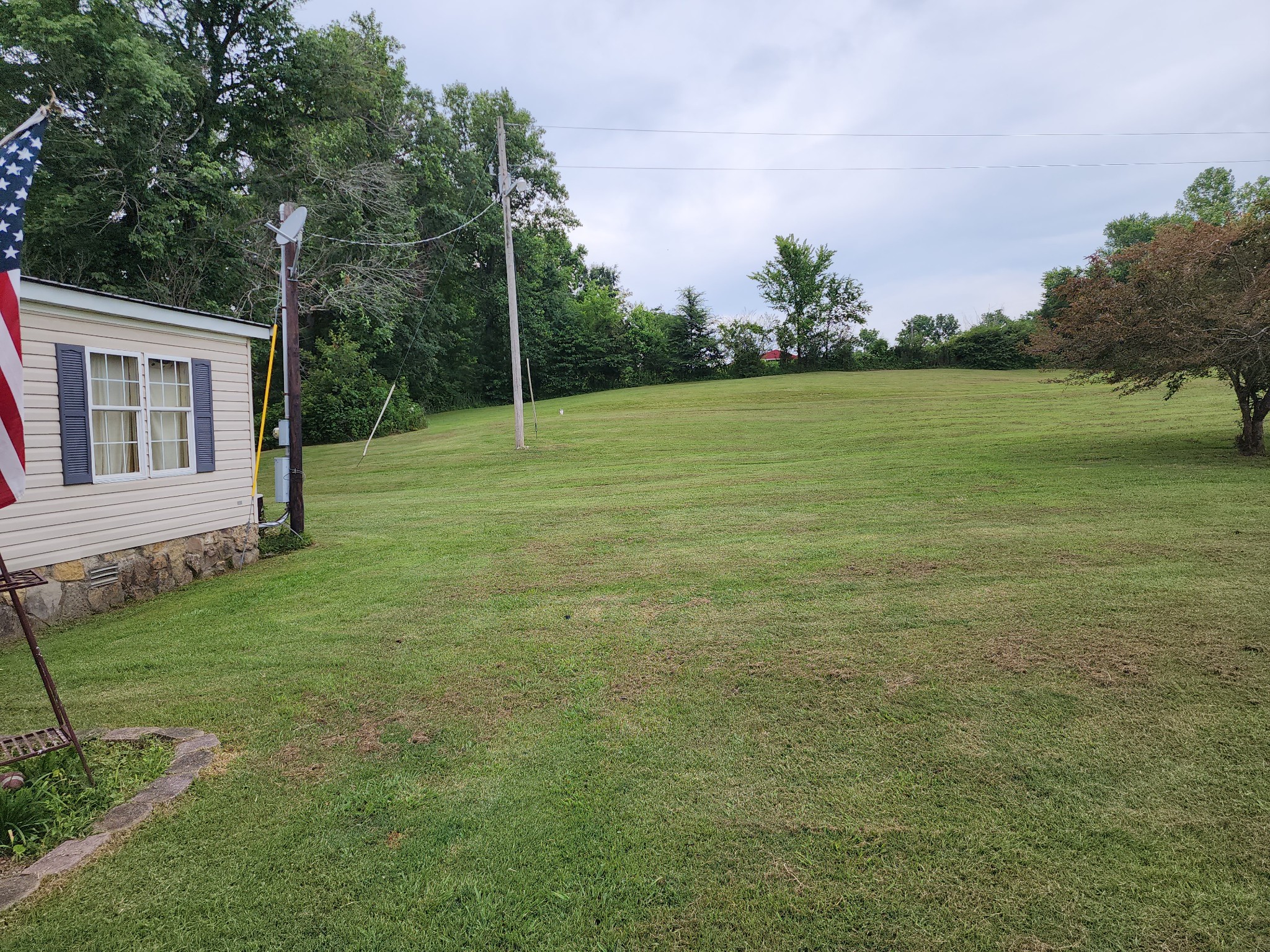 2228 Parker Road Morrison, TN 37357 - Photo 17 of 19 a backyard of a house with lots of green space