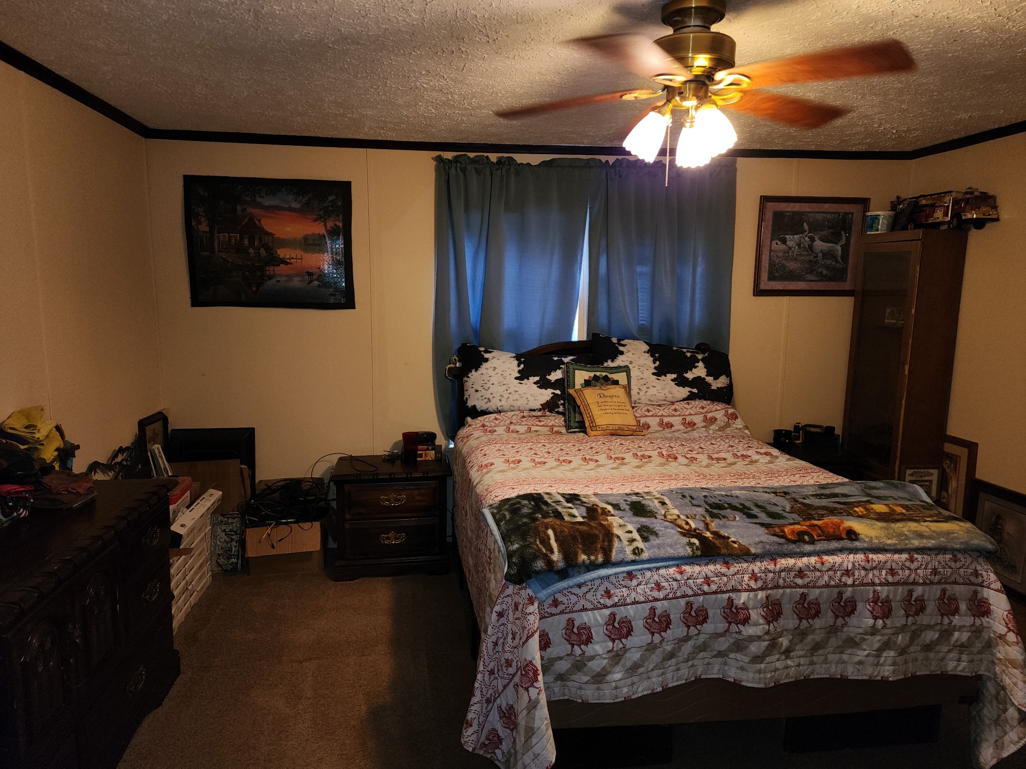 2228 Parker Road Morrison, TN 37357 - Photo 8 of 19 a bedroom with a bed a dresser and wooden floor