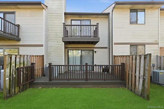 a view of a backyard with a deck