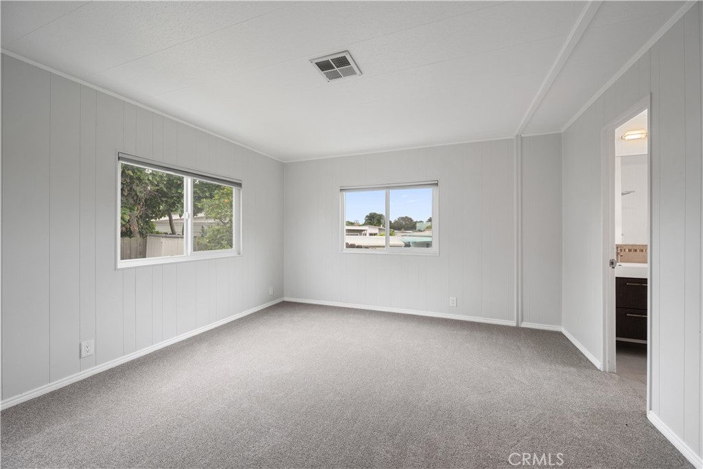 1675 Los Osos Valley Road, Unit 135 Los Osos, CA 93402 - Photo 19 of 38 a view of an empty room with a window