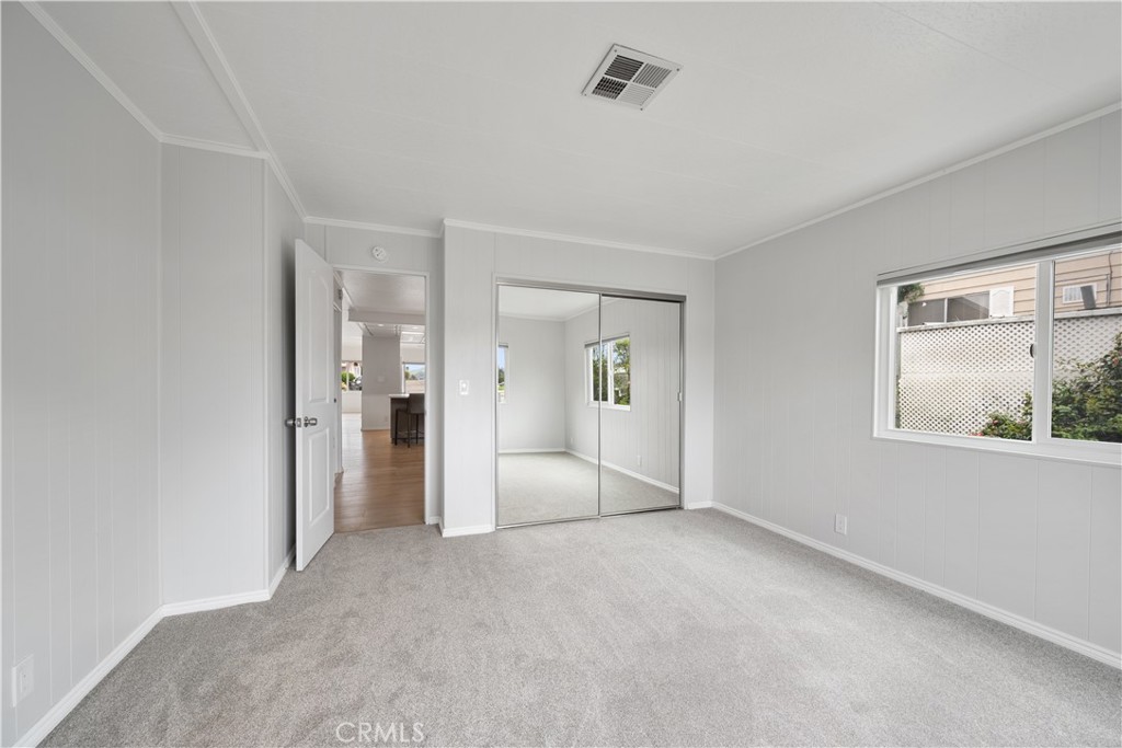 1675 Los Osos Valley Road, Unit 135 Los Osos, CA 93402 - Photo 20 of 38 a view of an empty room with a window