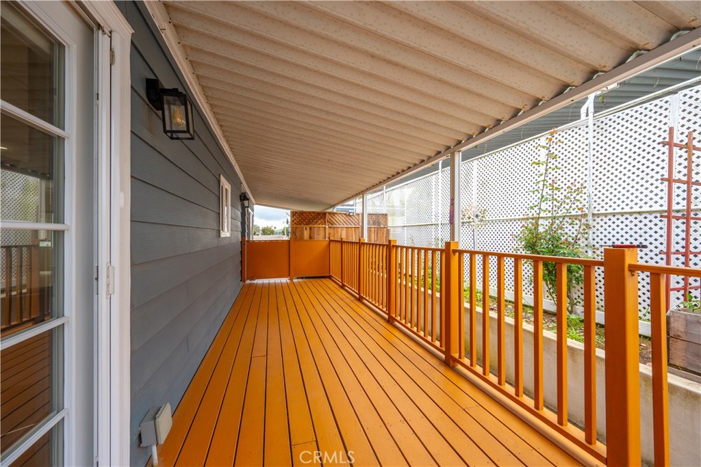 1675 Los Osos Valley Road, Unit 135 Los Osos, CA 93402 - Photo 30 of 38 a view of balcony with wooden floor