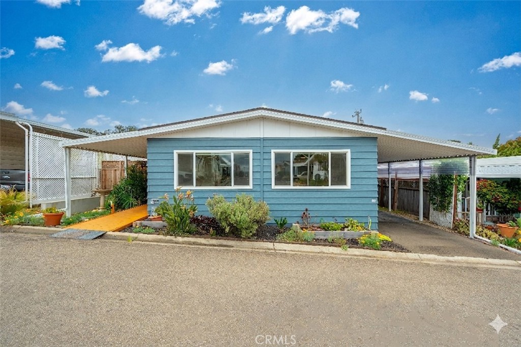 1675 Los Osos Valley Road, Unit 135 Los Osos, CA 93402 - Photo 3 of 38 Exterior – Zero stair entry way, fresh paint, and well-kept landscaping for a simple, inviting look.