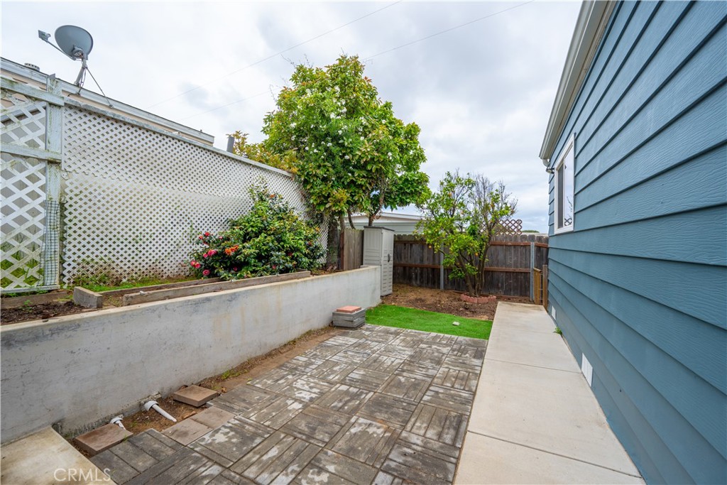 1675 Los Osos Valley Road, Unit 135 Los Osos, CA 93402 - Photo 31 of 38 a view of a back yard of the house