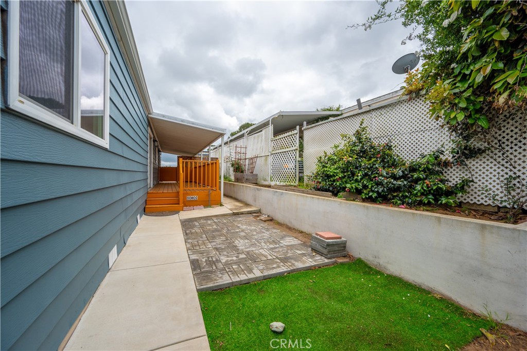1675 Los Osos Valley Road, Unit 135 Los Osos, CA 93402 - Photo 32 of 38 a view of a backyard with potted plants