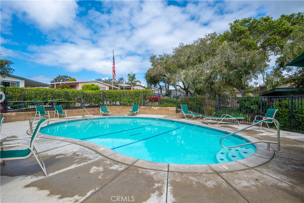 1675 Los Osos Valley Road, Unit 135 Los Osos, CA 93402 - Photo 37 of 38 a view of a swimming pool with a patio