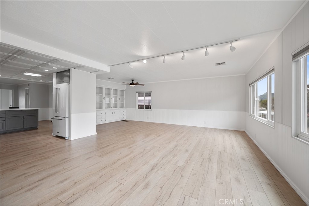 1675 Los Osos Valley Road, Unit 135 Los Osos, CA 93402 - Photo 9 of 38 a view of empty room with wooden floor