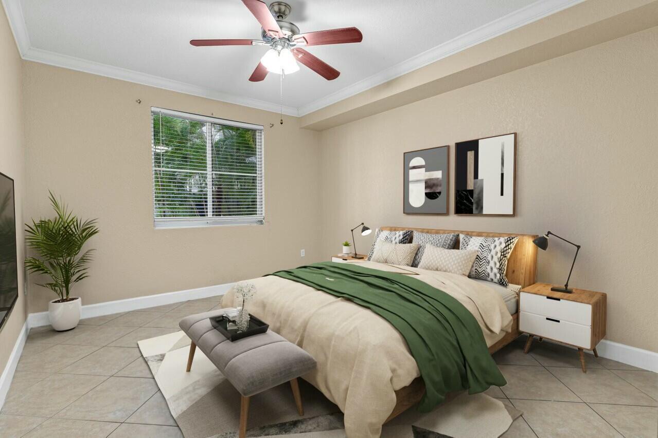 1690 Renaissance Commons Boulevard, Unit 1125 Boynton Beach, FL 33426 - Photo 3 of 37 a bedroom with a bed and window